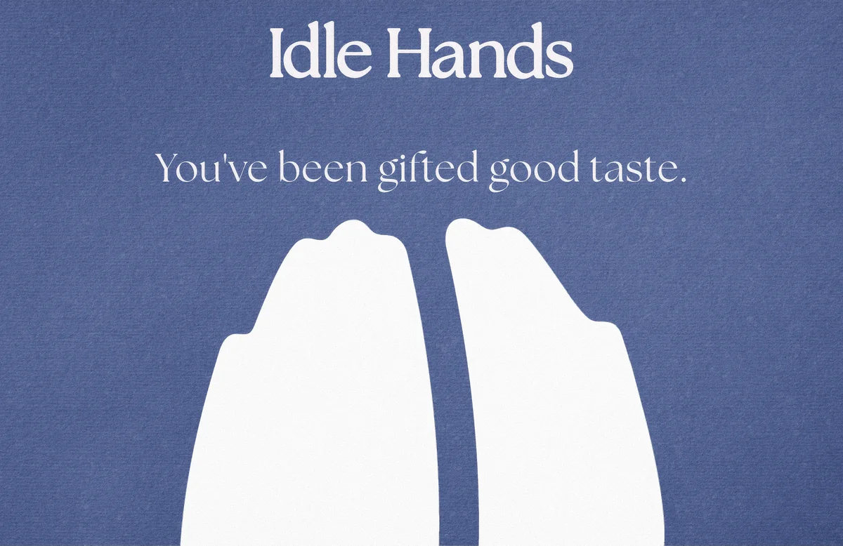 Idle Hands gift card front: dusk blue, the bean logo and the line You've been gifted good taste.